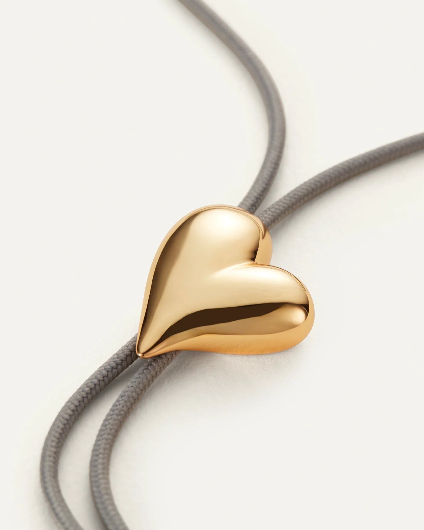 Heart sculpt bolo necklace