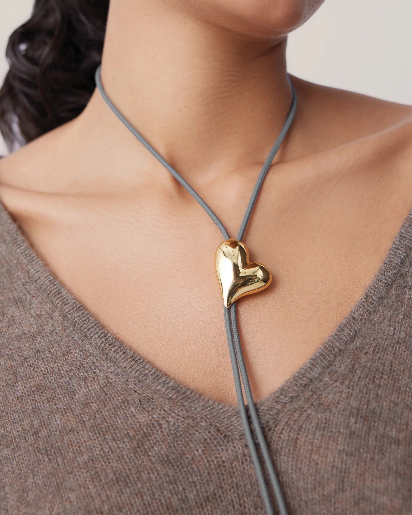 Heart sculpt bolo necklace