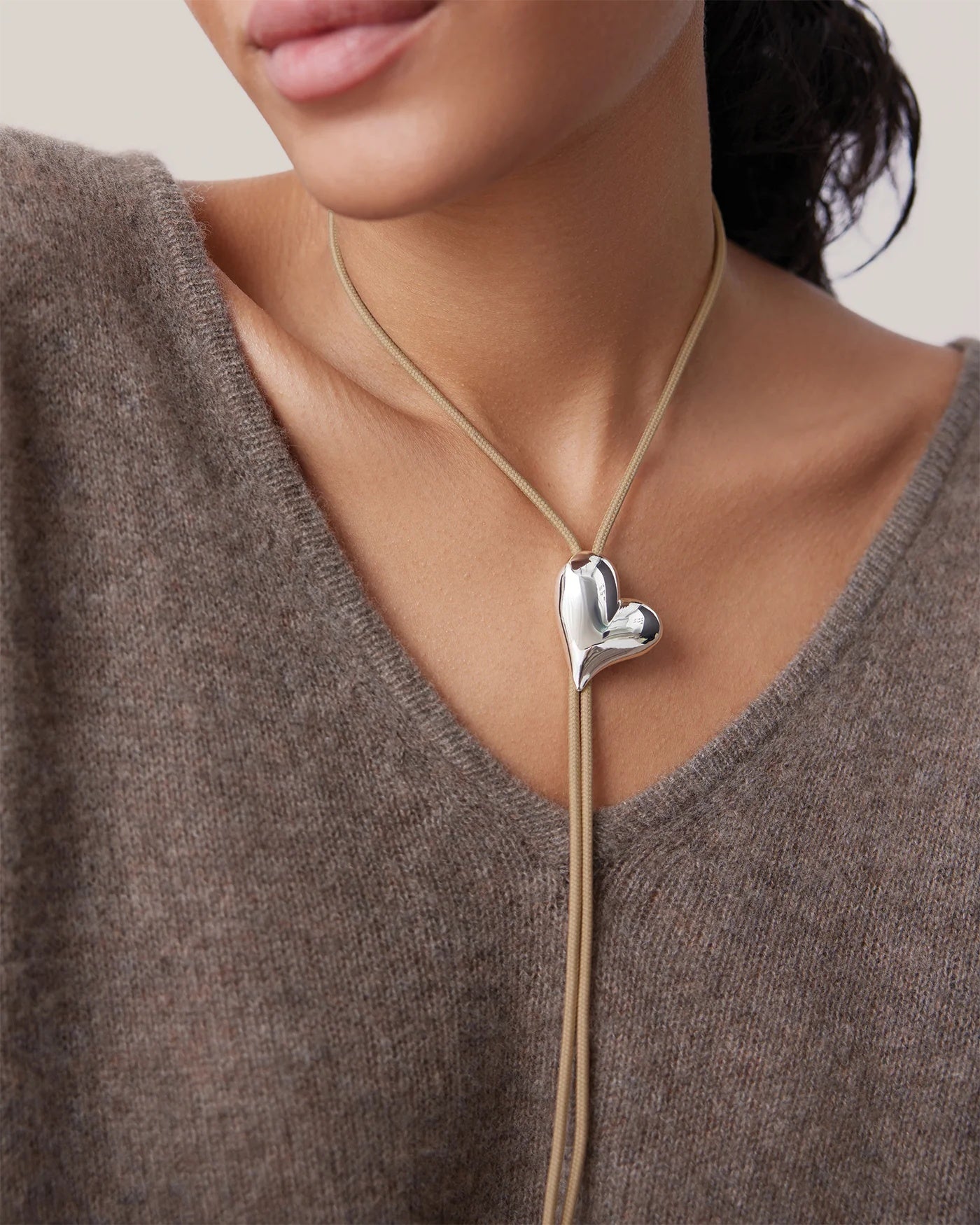 Heart sculpt bolo necklace