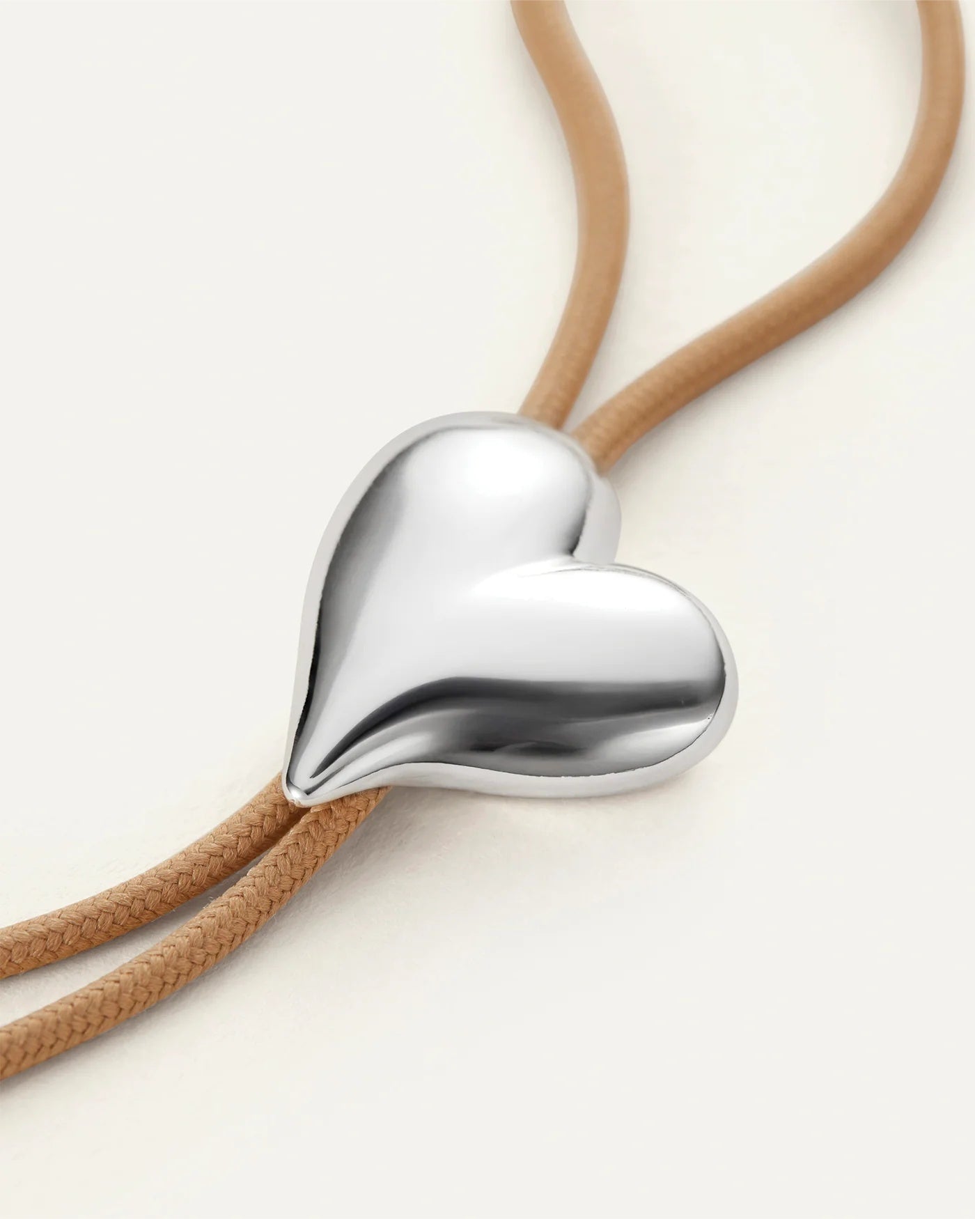 Heart sculpt bolo necklace