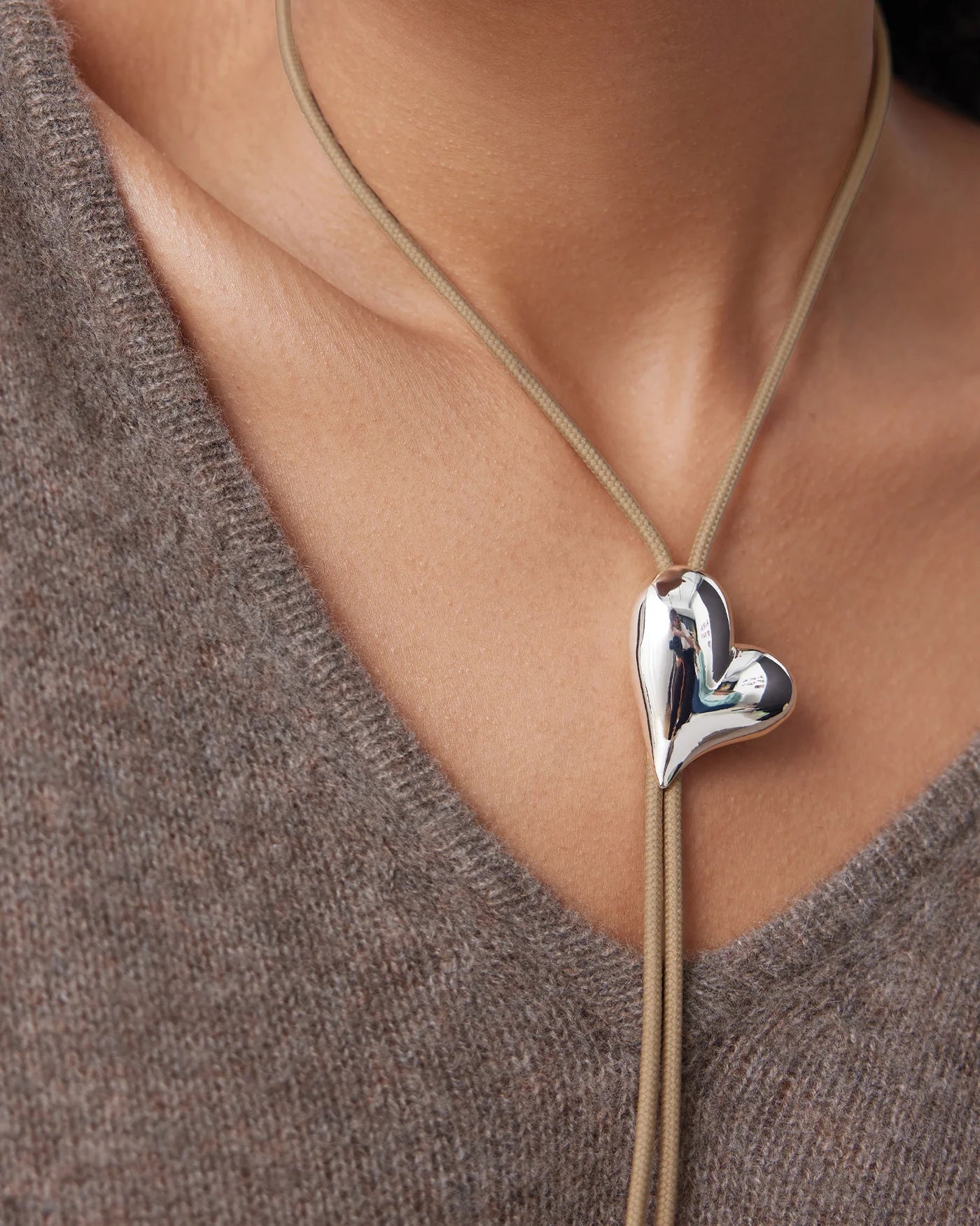 Heart sculpt bolo necklace